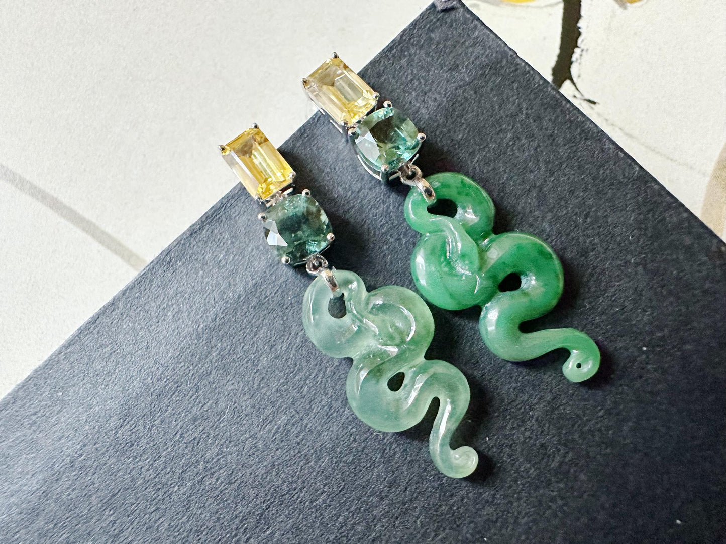 Natural Myanmar Asymmetric Jade Snake Earrings in 18K White Gold with Yellow Sapphires and Garnet
