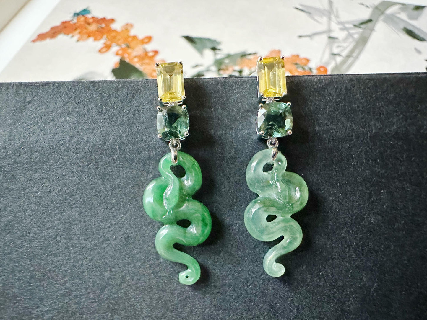 Natural Myanmar Asymmetric Jade Snake Earrings in 18K White Gold with Yellow Sapphires and Garnet