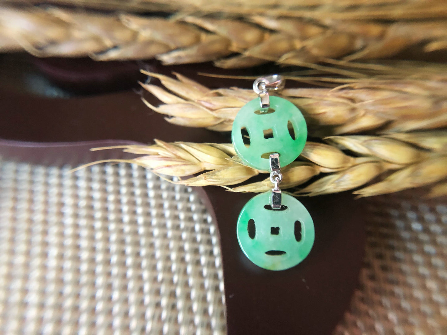 Vivid Green Jadeite Pendant with Ancient Coin Design
