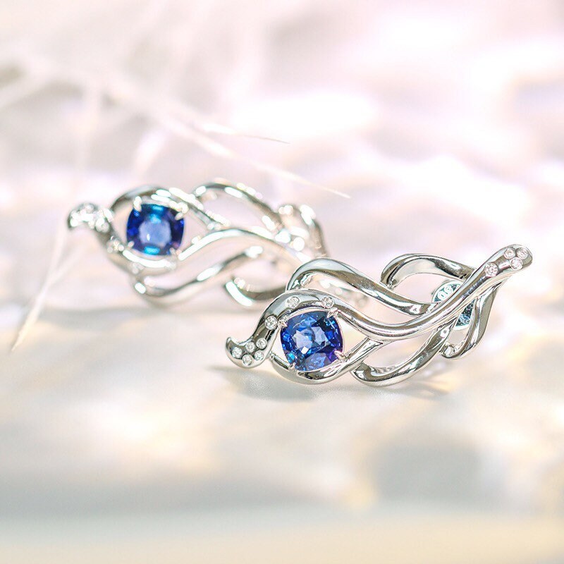 Blue Sapphire Diamond Feather Earrings in 18K White Gold