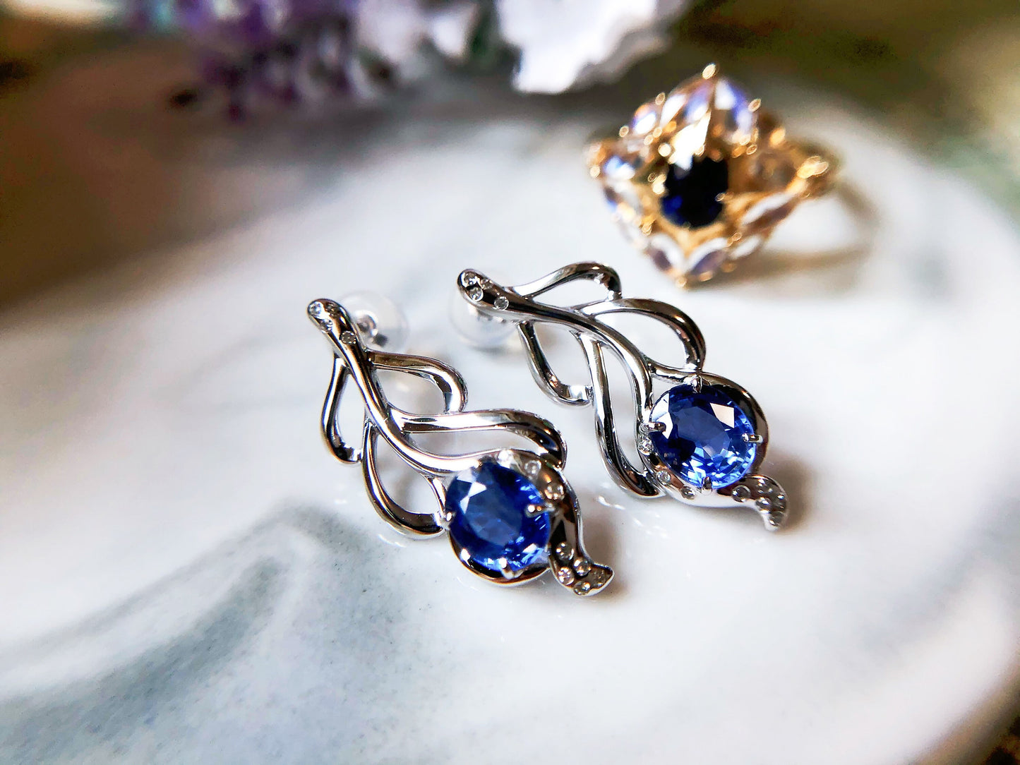 Blue Sapphire Diamond Feather Earrings in 18K White Gold