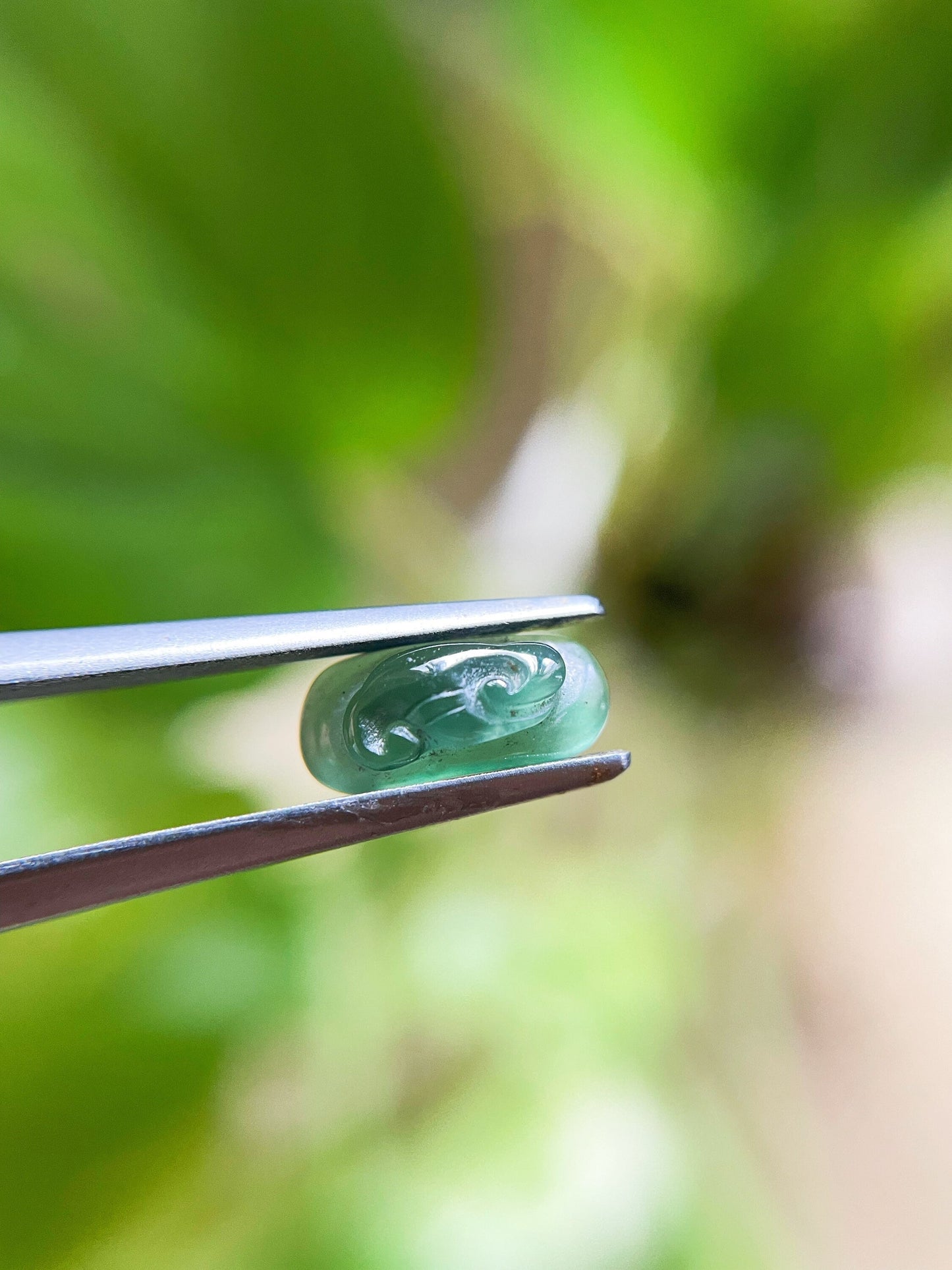 Green Jadeite Carved Saddle Cut Gemstone