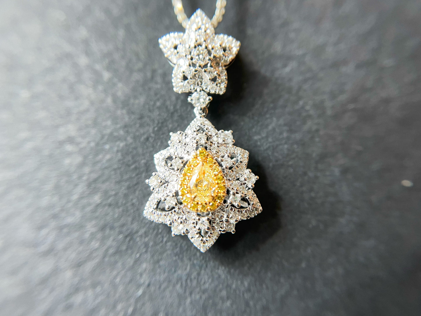 Yellow Diamond Pendant in 18K White Gold with Diamond Accents