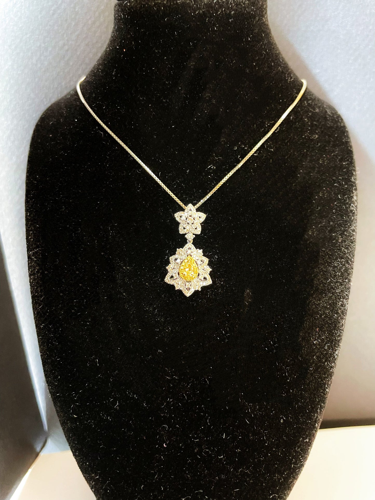 Yellow Diamond Pendant in 18K White Gold with Diamond Accents