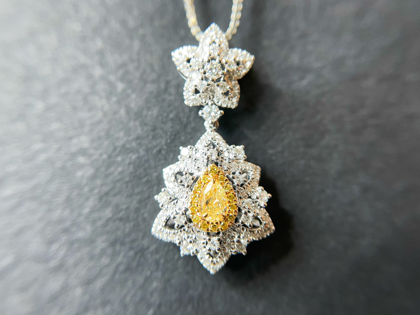 Yellow Diamond Pendant in 18K White Gold with Diamond Accents