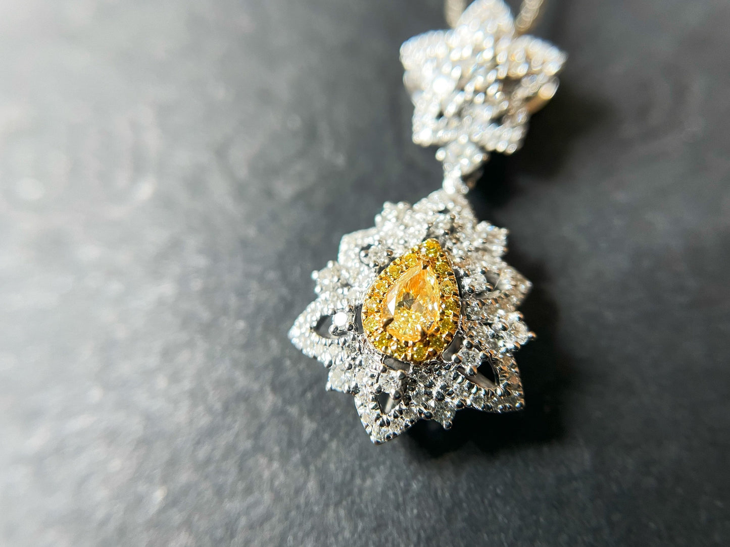 Yellow Diamond Pendant in 18K White Gold with Diamond Accents